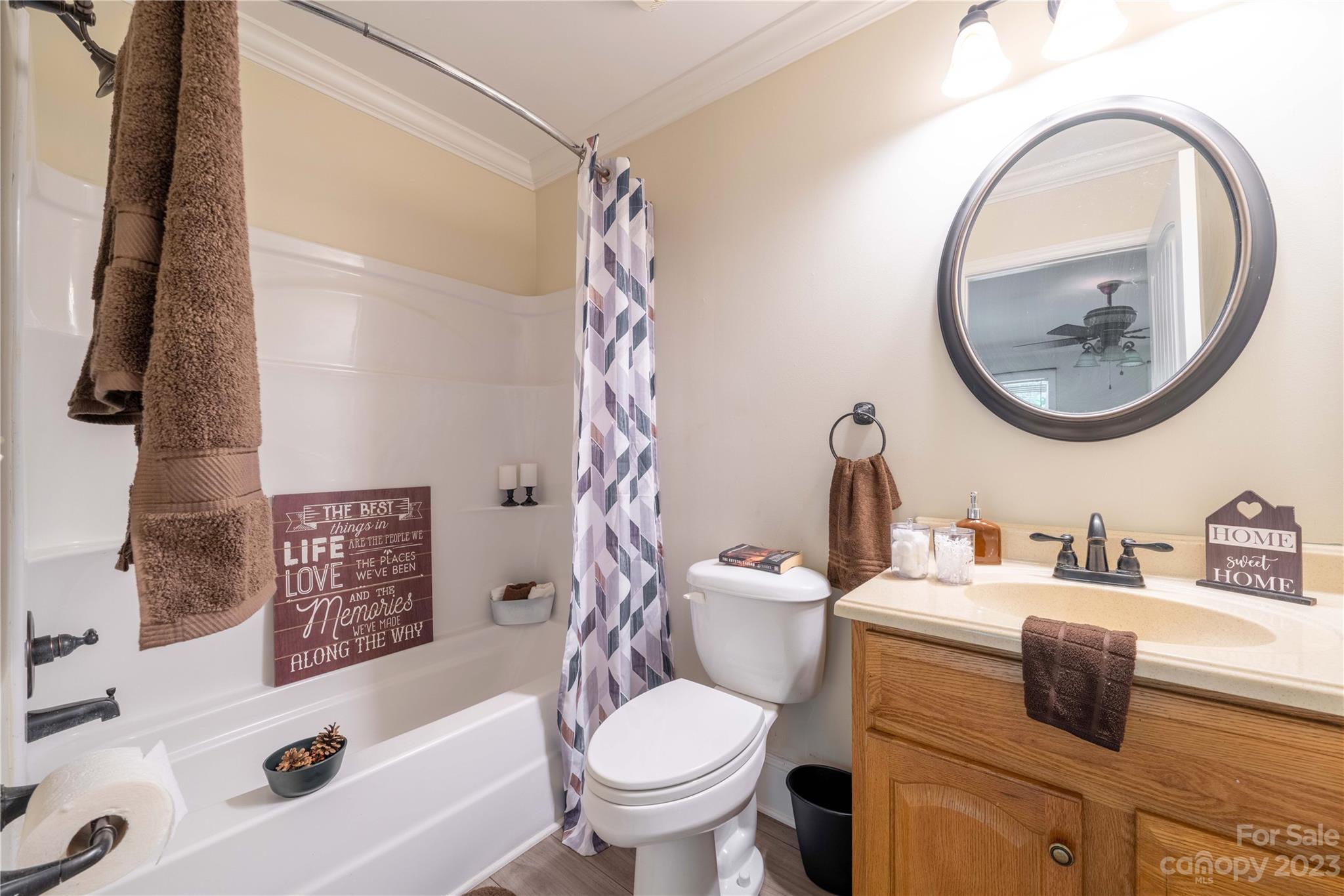 507 Cook Street Kannapolis, NC 28083 - Photo 9 of 38 a bathroom with a sink a toilet and a bathtub