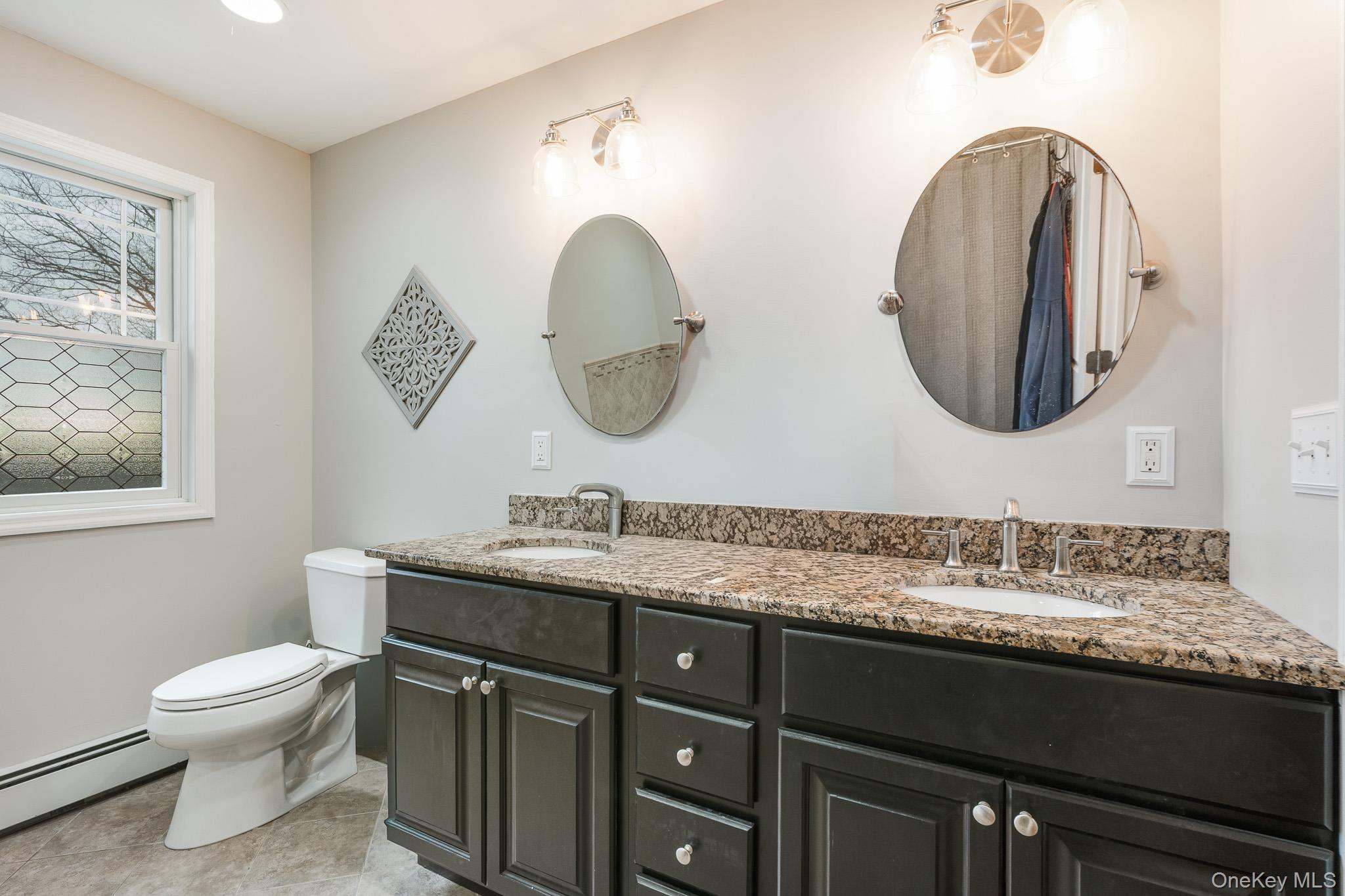 112 Pleasantview Road Pleasant Valley, NY 12569 - Photo 21 of 30 Bathroom featuring double vanity and baseboard heating