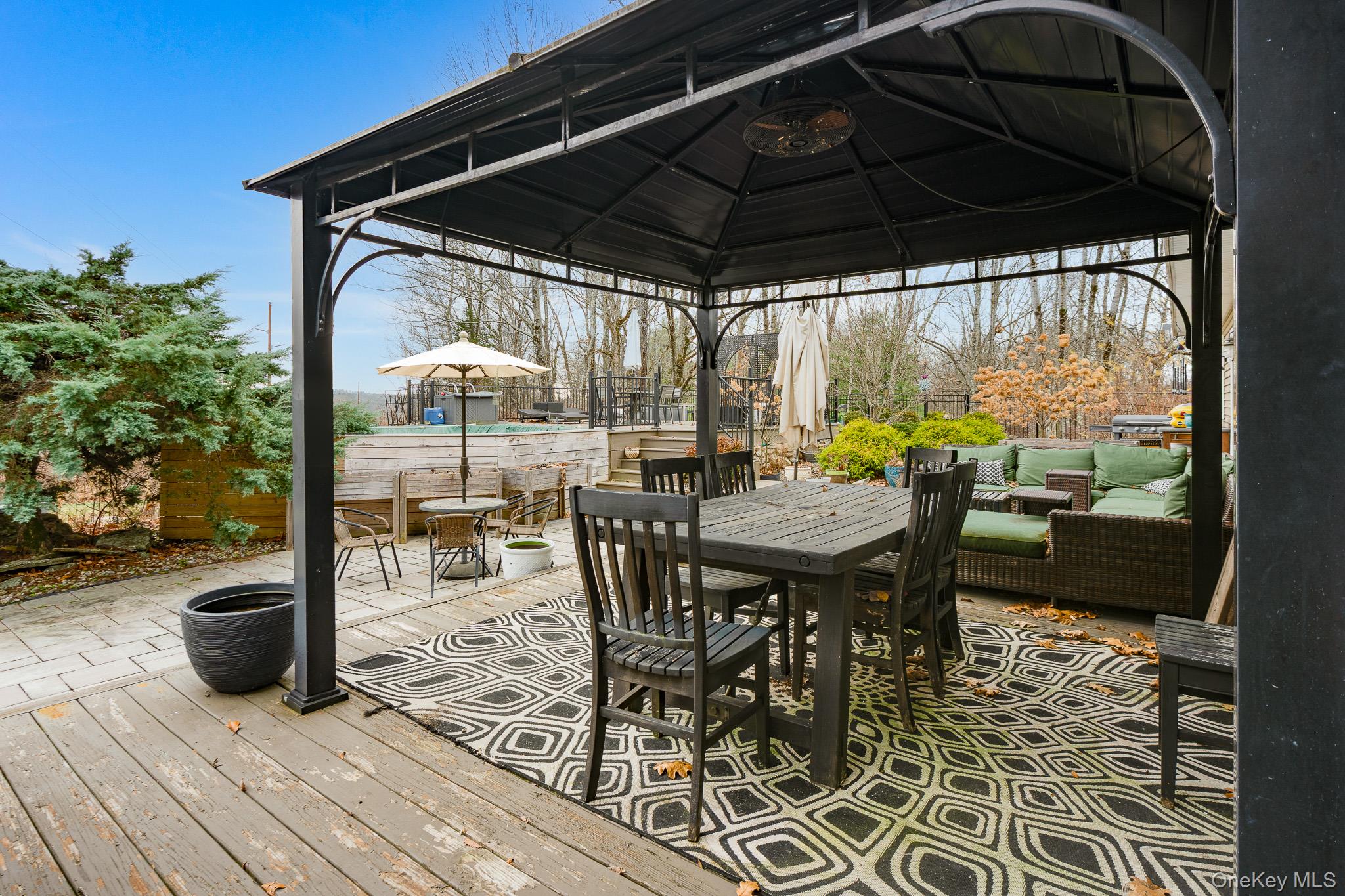 112 Pleasantview Road Pleasant Valley, NY 12569 - Photo 24 of 30 Wooden terrace with a gazebo, outdoor dining space, and a patio area