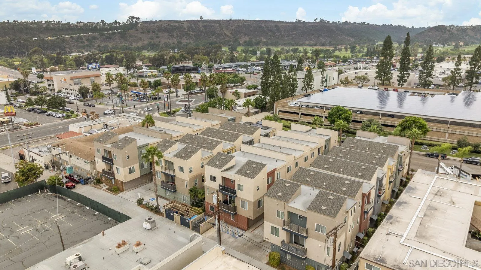 4541 Rainier Avenue, Unit 13 San Diego, CA 92120 - Photo 30 of 36 a view of a city with a mountain