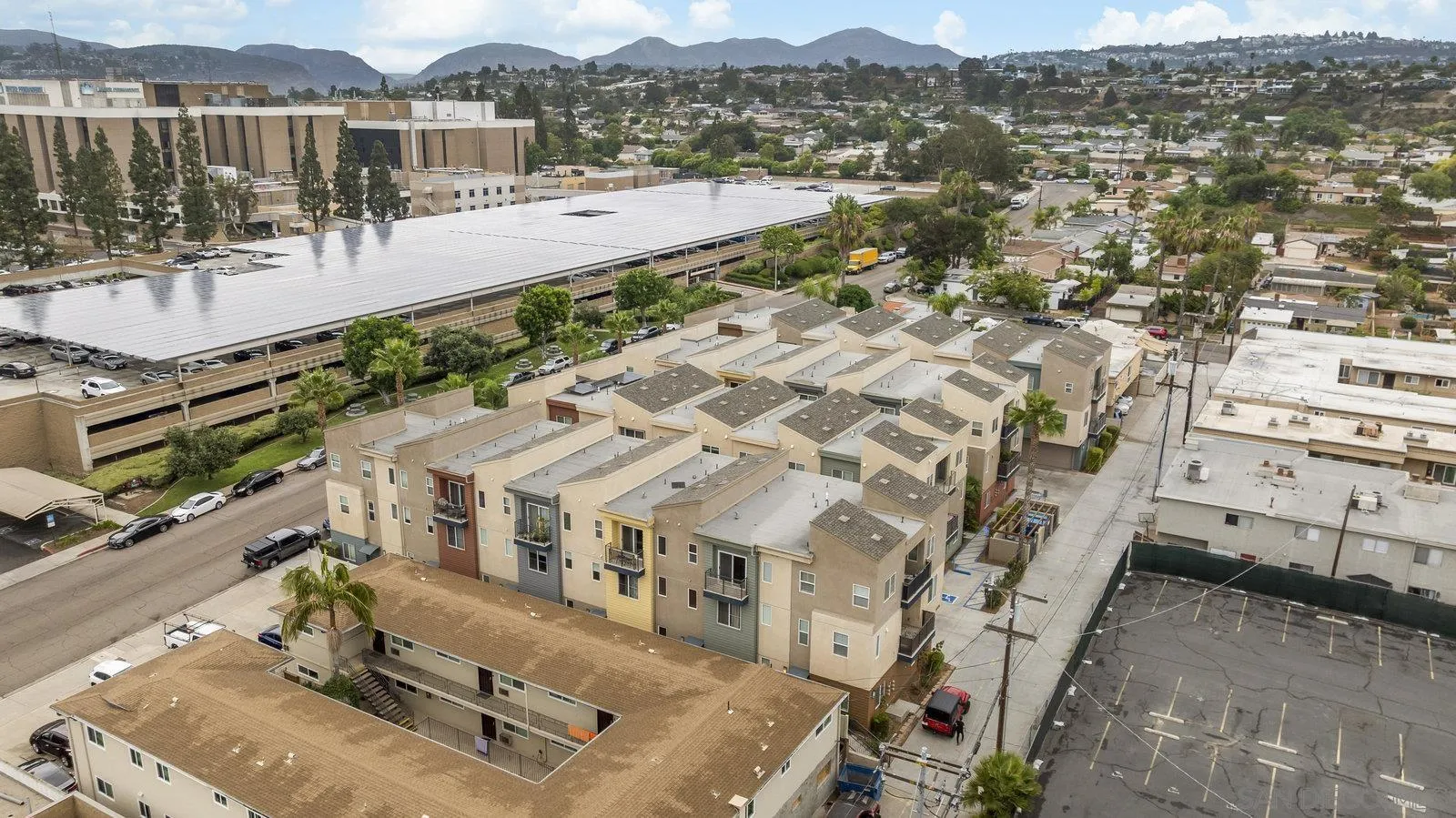 4541 Rainier Avenue, Unit 13 San Diego, CA 92120 - Photo 31 of 36 a view of a city with tall buildings