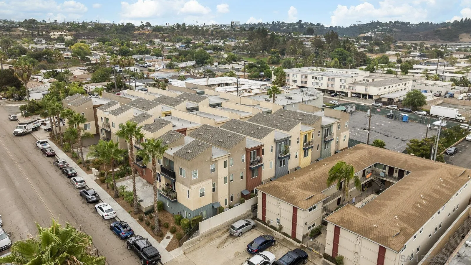 4541 Rainier Avenue, Unit 13 San Diego, CA 92120 - Photo 32 of 36 a view of a city with tall buildings