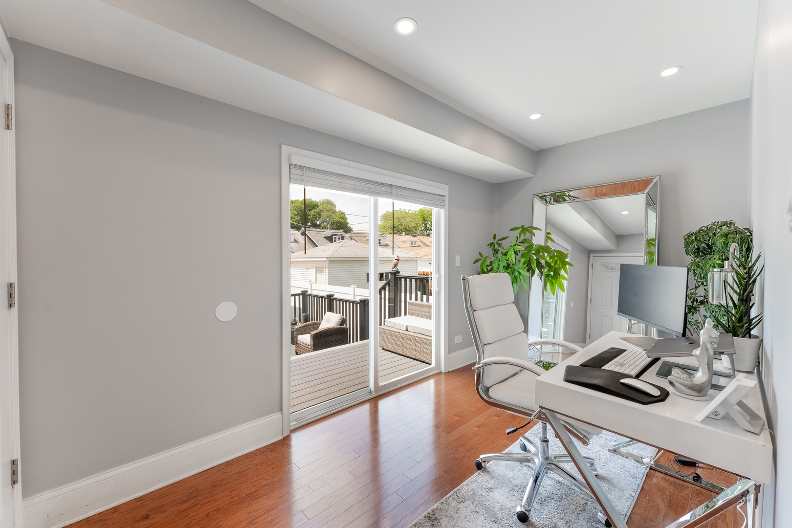 2610 North Major Avenue Chicago, IL 60639 - Photo 14 of 45 a view of a workspace with furniture and a potted plant