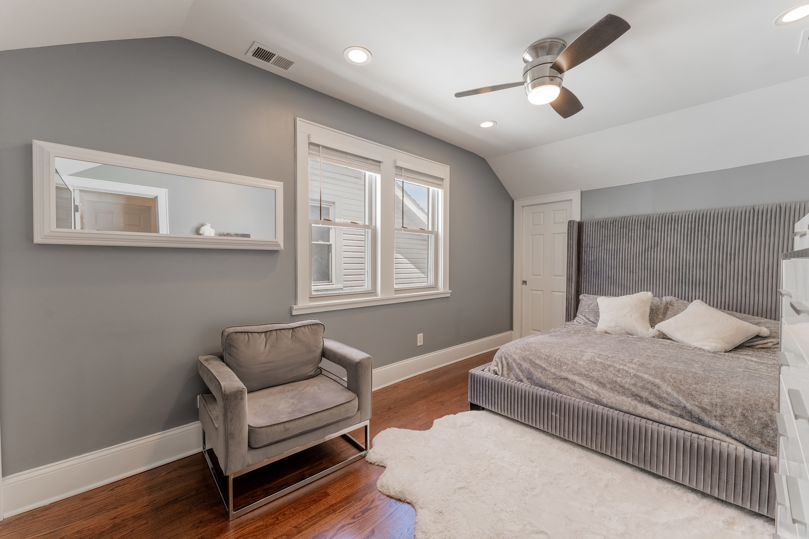 2610 North Major Avenue Chicago, IL 60639 - Photo 17 of 45 a bedroom with a bed furniture and wooden floor