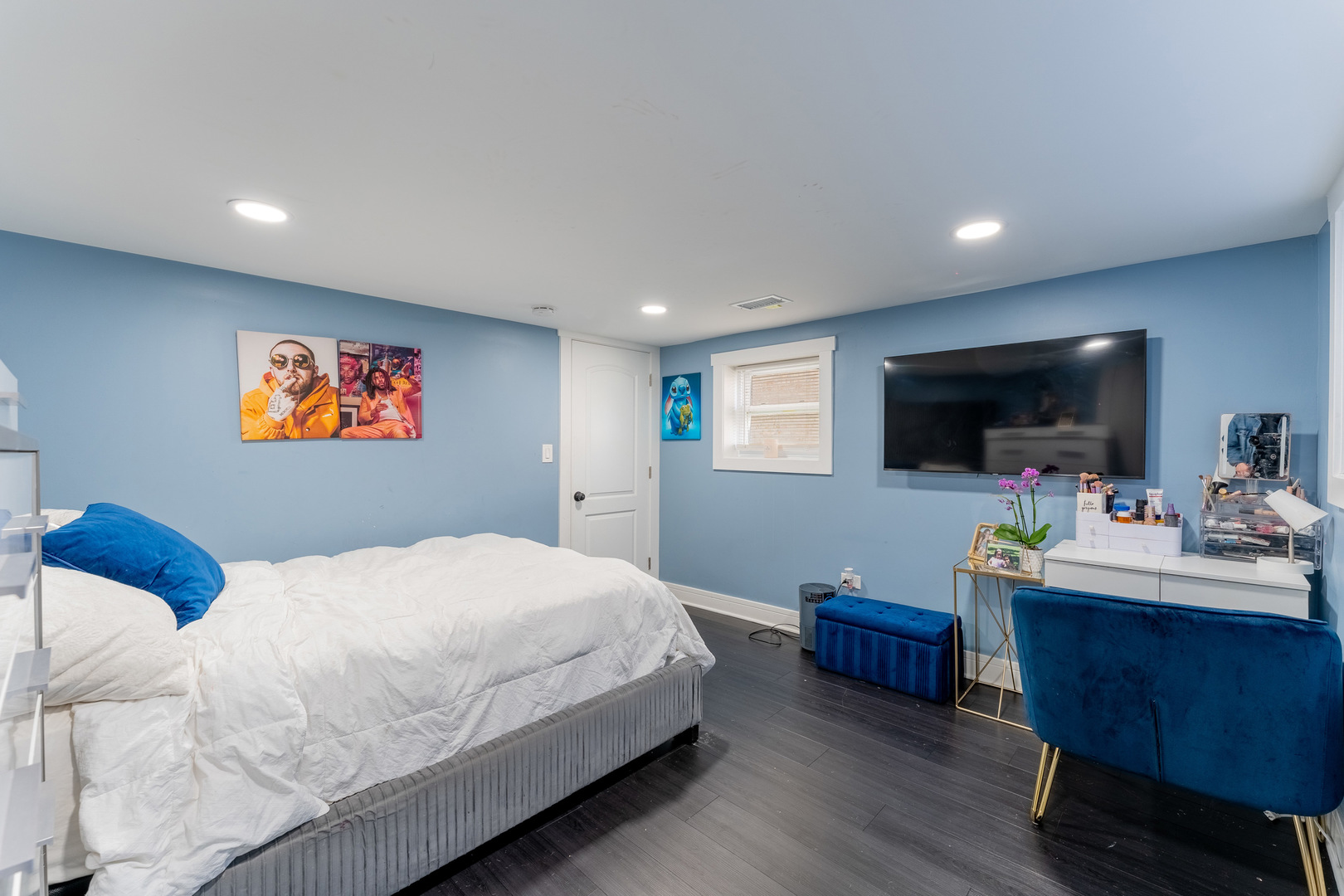 2610 North Major Avenue Chicago, IL 60639 - Photo 26 of 45 a bedroom with a large bed and a flat screen tv