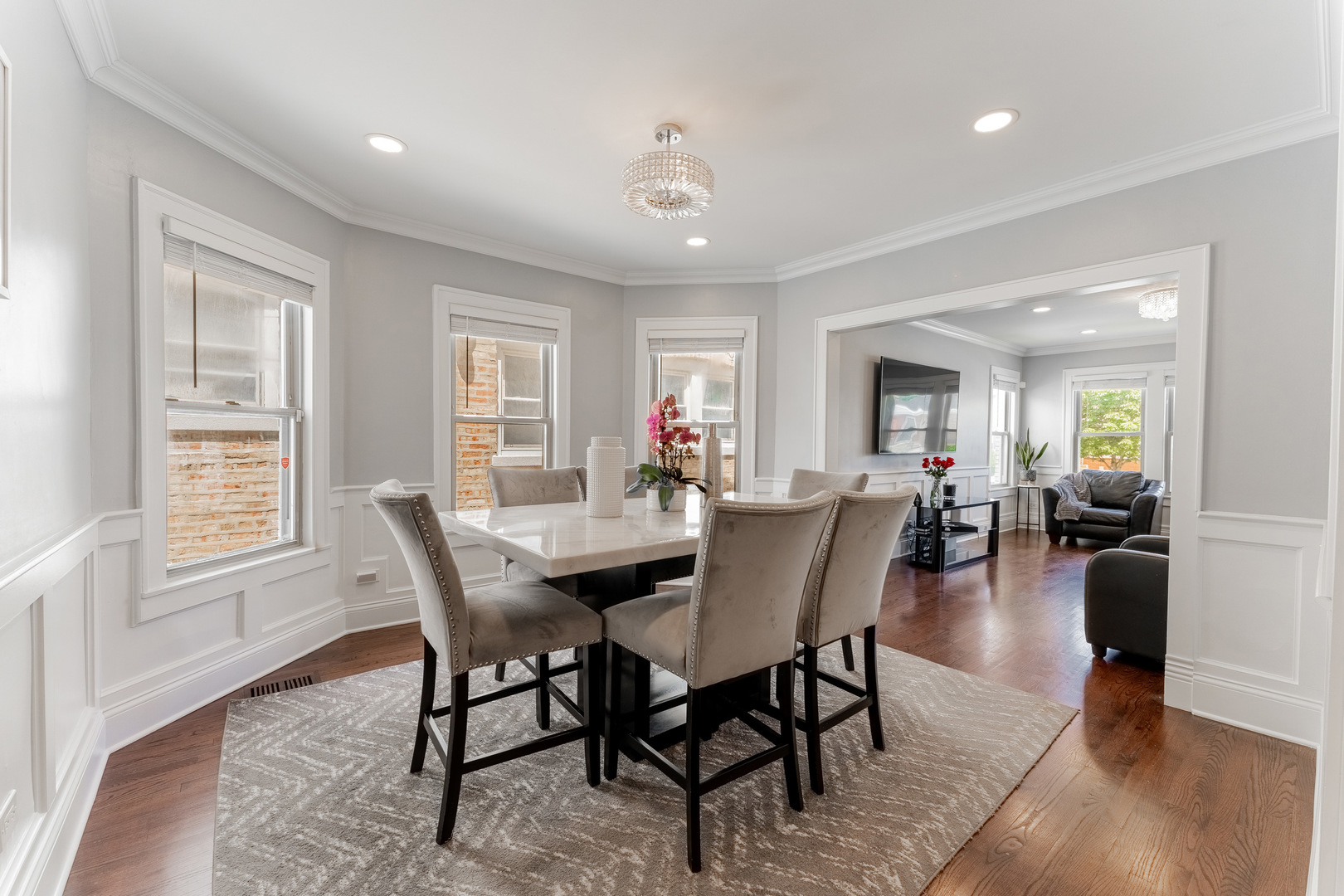 2610 North Major Avenue Chicago, IL 60639 - Photo 8 of 45 a view of a dining room with furniture and wooden floor