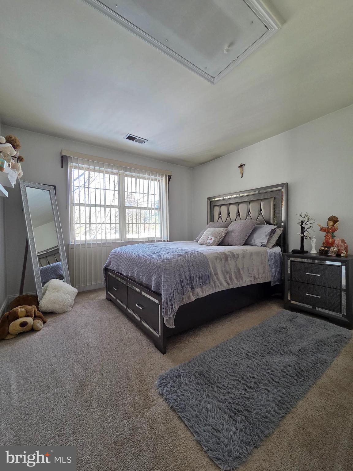 130 Laurel Court Reading, PA 19610 - Photo 20 of 29 a bedroom with a bed a couch and dresser
