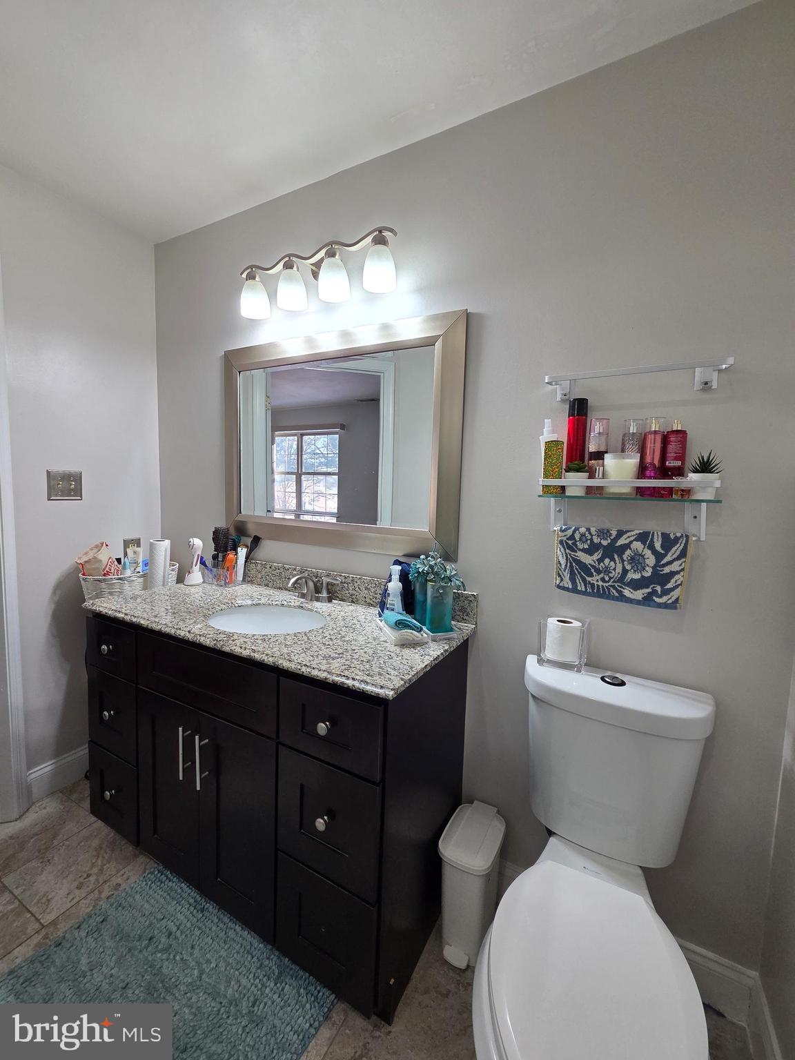 130 Laurel Court Reading, PA 19610 - Photo 25 of 29 a bathroom with a toilet sink and mirror