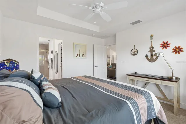 a bathroom with a double vanity sink mirror and shower
