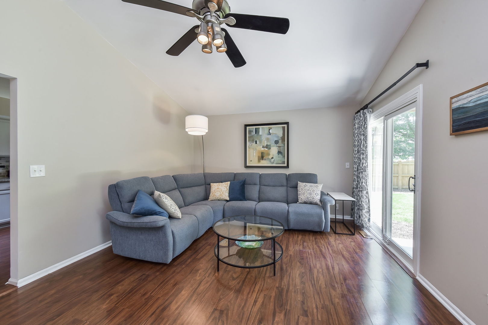 3136 Quincy Lane Aurora, IL 60504 - Photo 11 of 23 a living room with furniture and a wooden floor