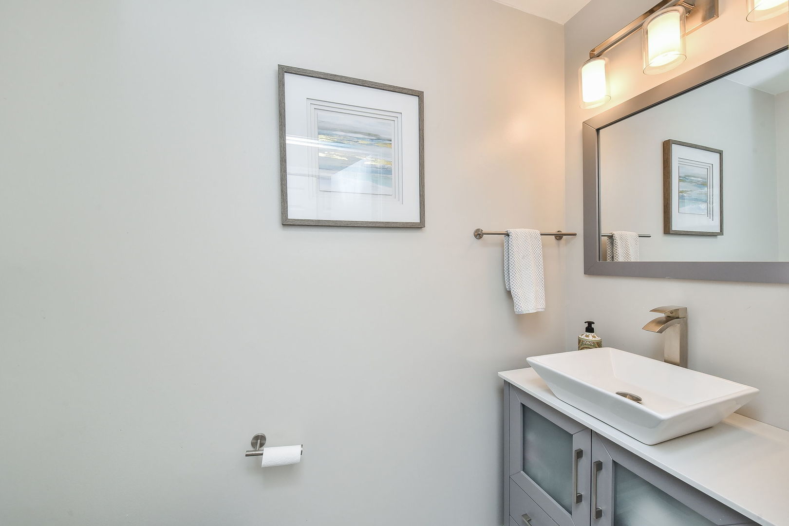 3136 Quincy Lane Aurora, IL 60504 - Photo 13 of 23 a bathroom with a sink and a mirror