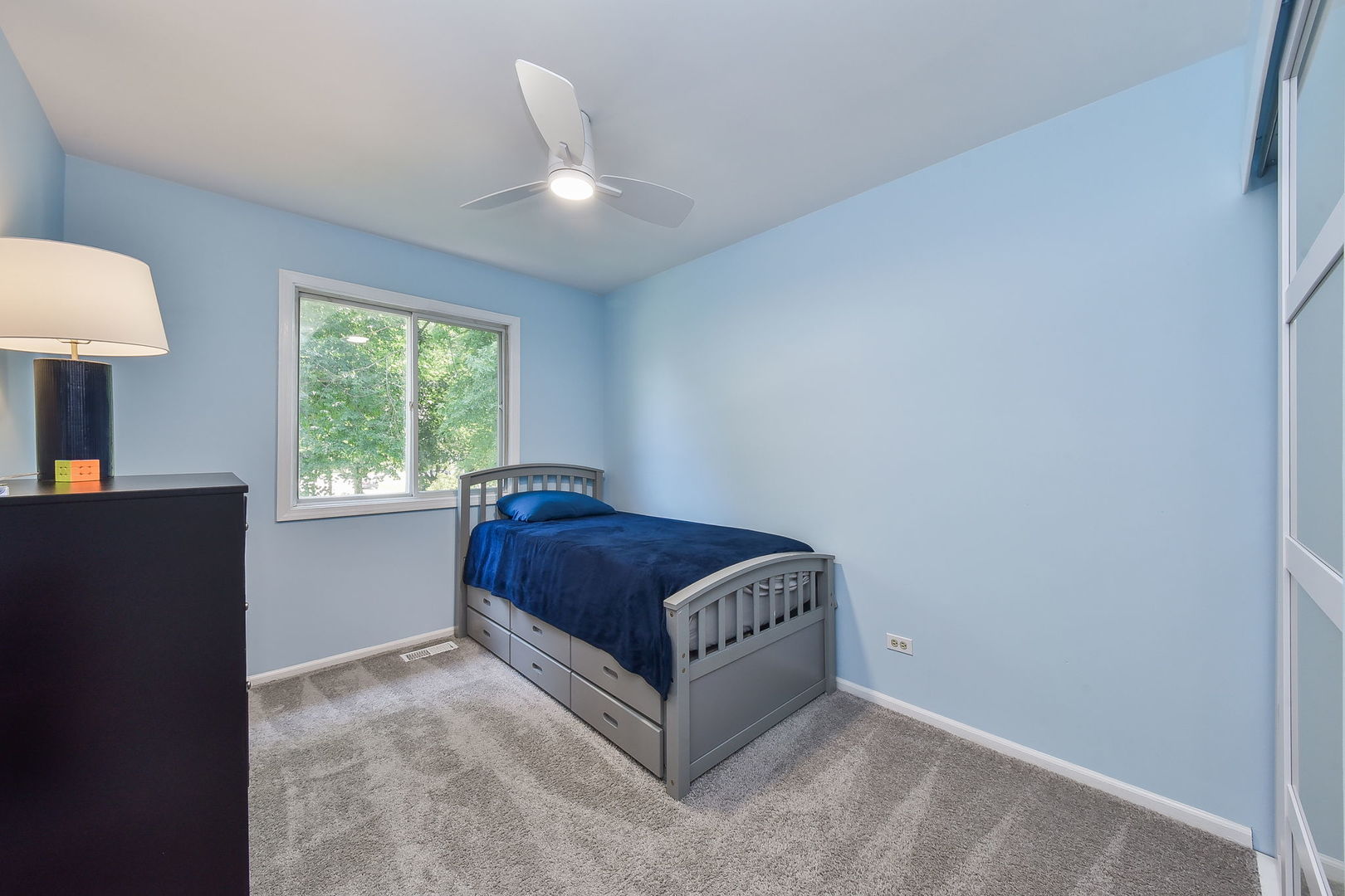 3136 Quincy Lane Aurora, IL 60504 - Photo 16 of 23 a spacious bedroom with a bed and a window
