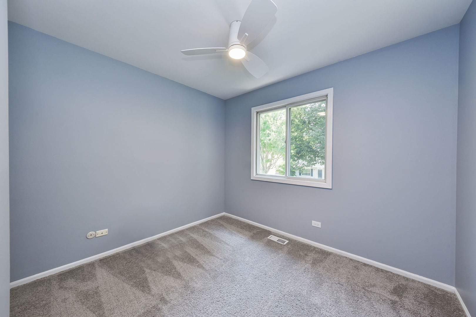 3136 Quincy Lane Aurora, IL 60504 - Photo 17 of 23 an empty room with a window