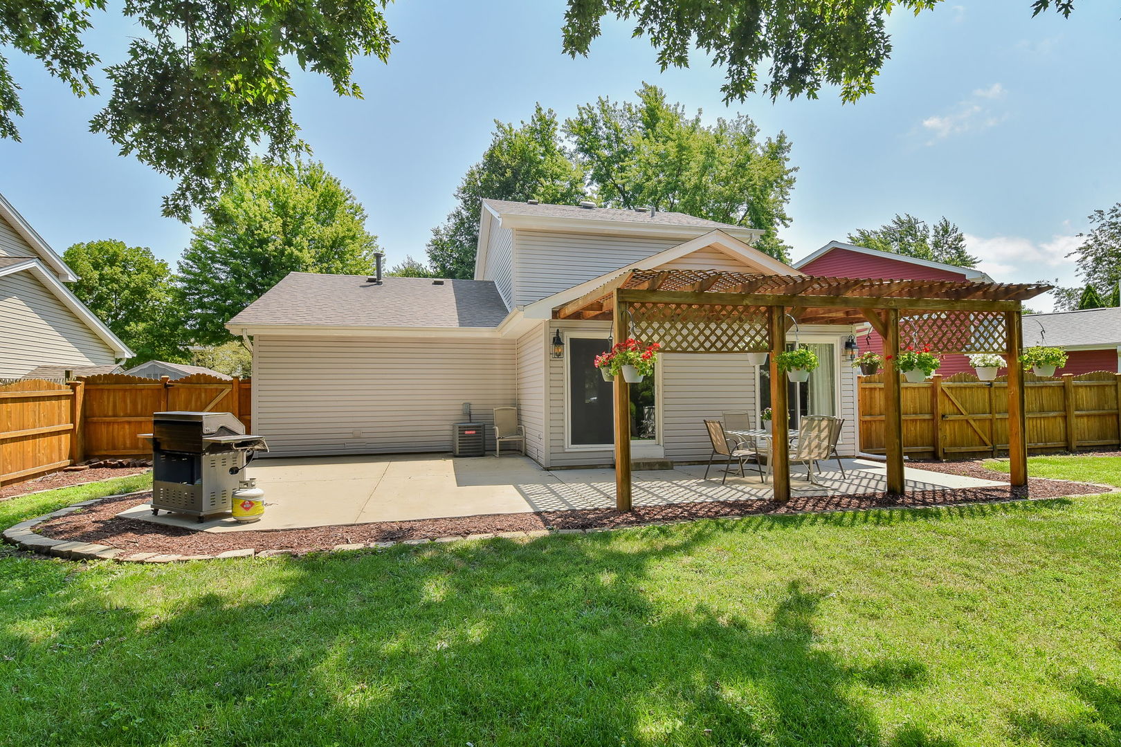 3136 Quincy Lane Aurora, IL 60504 - Photo 22 of 23 a front view of a house with garden