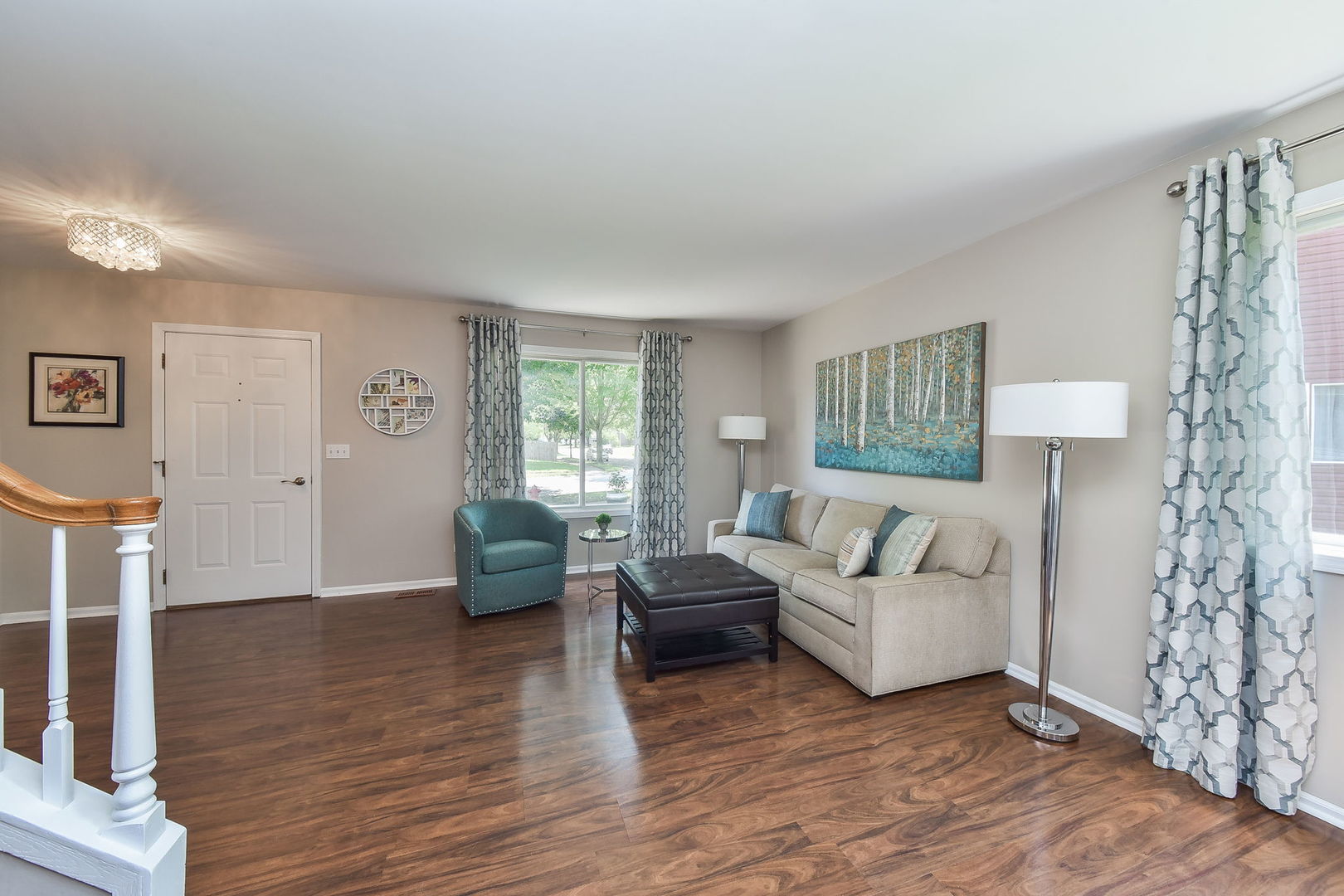 3136 Quincy Lane Aurora, IL 60504 - Photo 4 of 23 a living room with furniture and a wooden floor