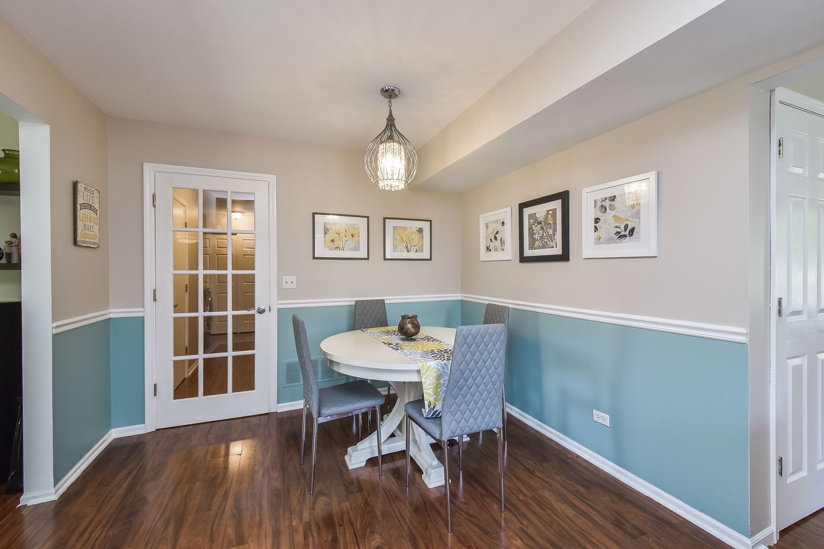 3136 Quincy Lane Aurora, IL 60504 - Photo 8 of 23 a view of a dining room with furniture window and wooden floor