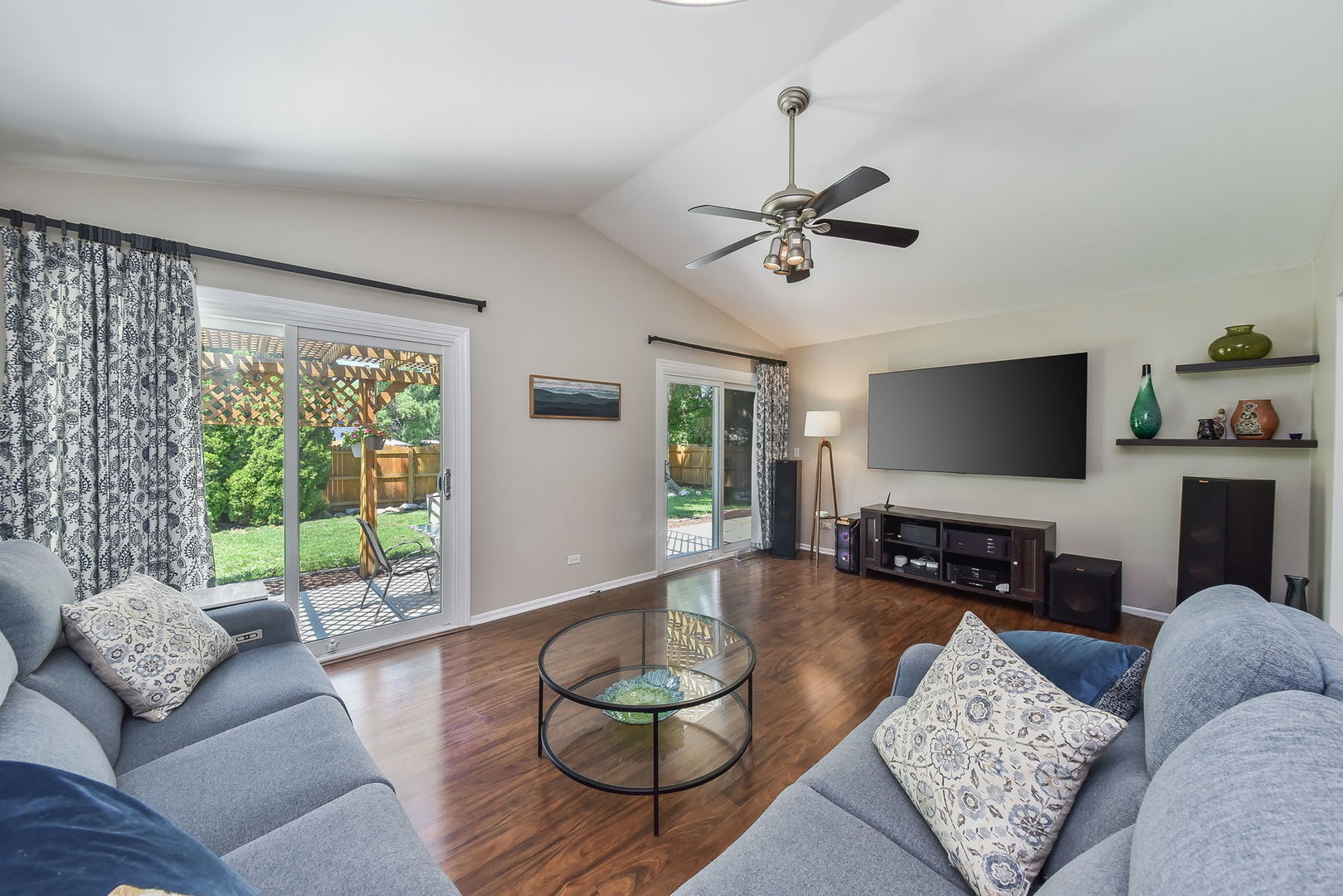 3136 Quincy Lane Aurora, IL 60504 - Photo 10 of 23 a living room with furniture and a flat screen tv