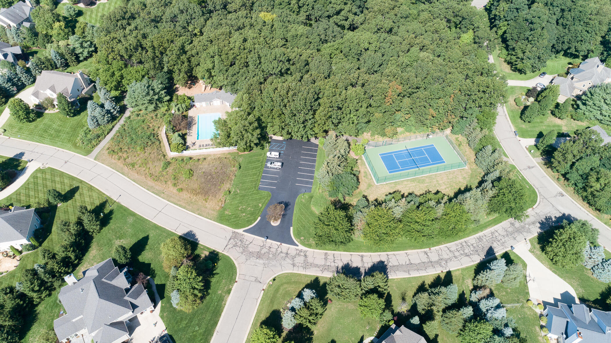 8184 Barony Point Mattawan, MI 49071 - Photo 84 of 85 drone of community pool and tennis court