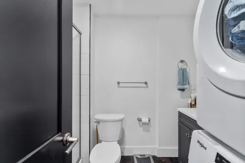 a bathroom with a toilet and a sink