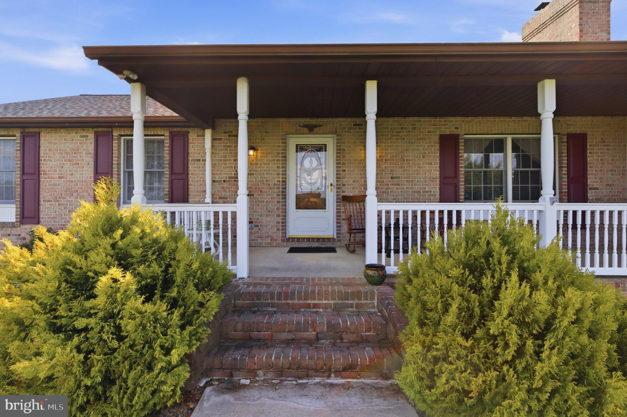18310 Upper Beckleysville Road Hampstead, MD 21074 - Photo 8 of 67 Charming porch with inviting entryway.