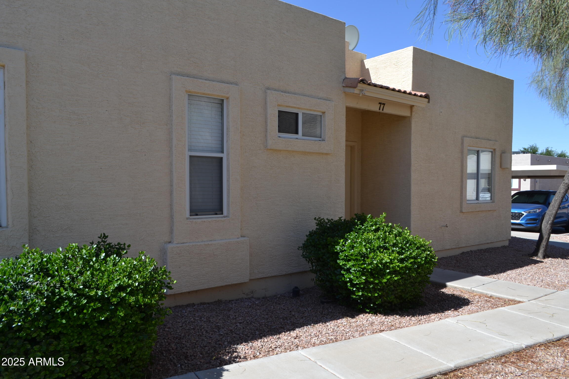 2300 East Magma Road, Unit 77 San Tan Valley, AZ 85143 - Photo 1 of 12 a view of a backyard