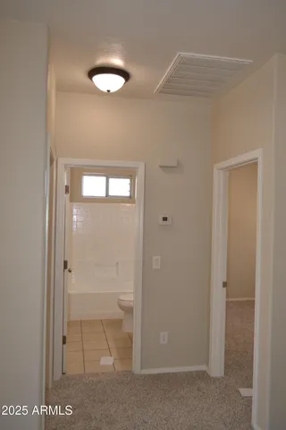 a bathroom with a toilet
