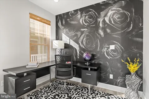 a bed room with a bed window and a couch