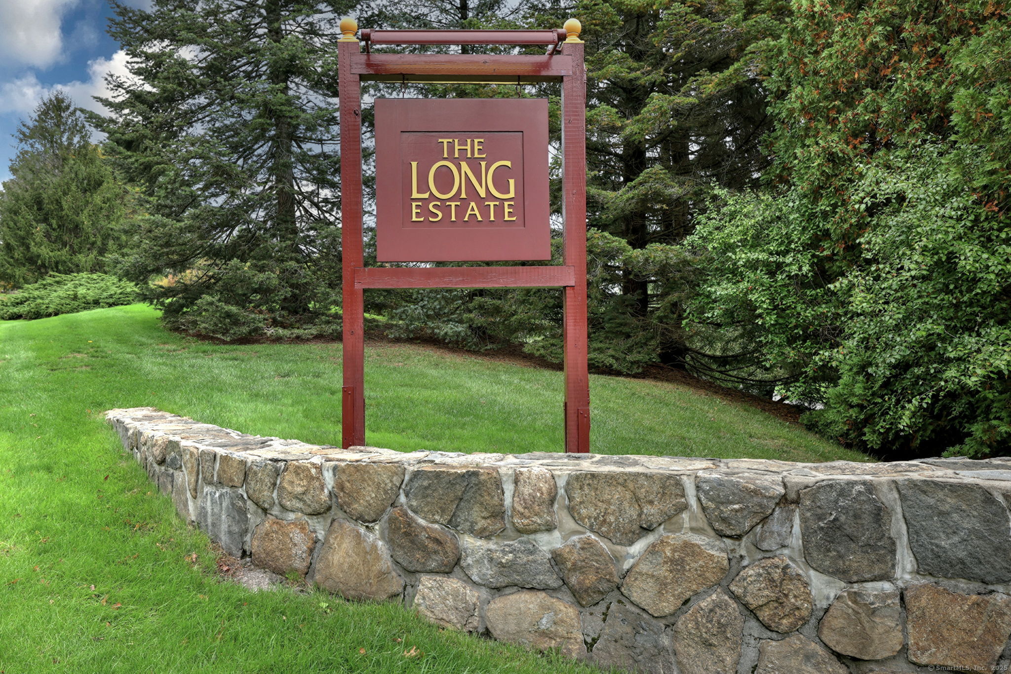 a view of outdoor space with garden and seating area