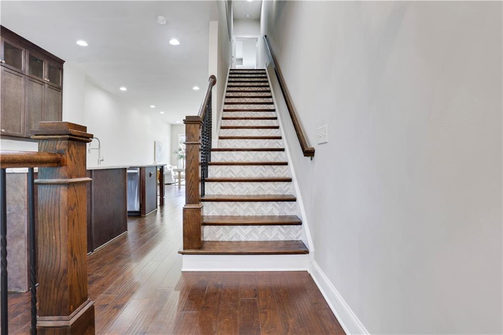 4103 Township Parkway Atlanta, GA 30342 - Photo 13 of 42 a view of entryway and hall with wooden floor