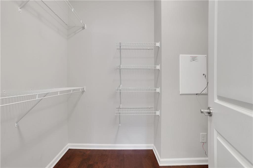 4103 Township Parkway Atlanta, GA 30342 - Photo 19 of 42 a view of walk in closet with empty racks