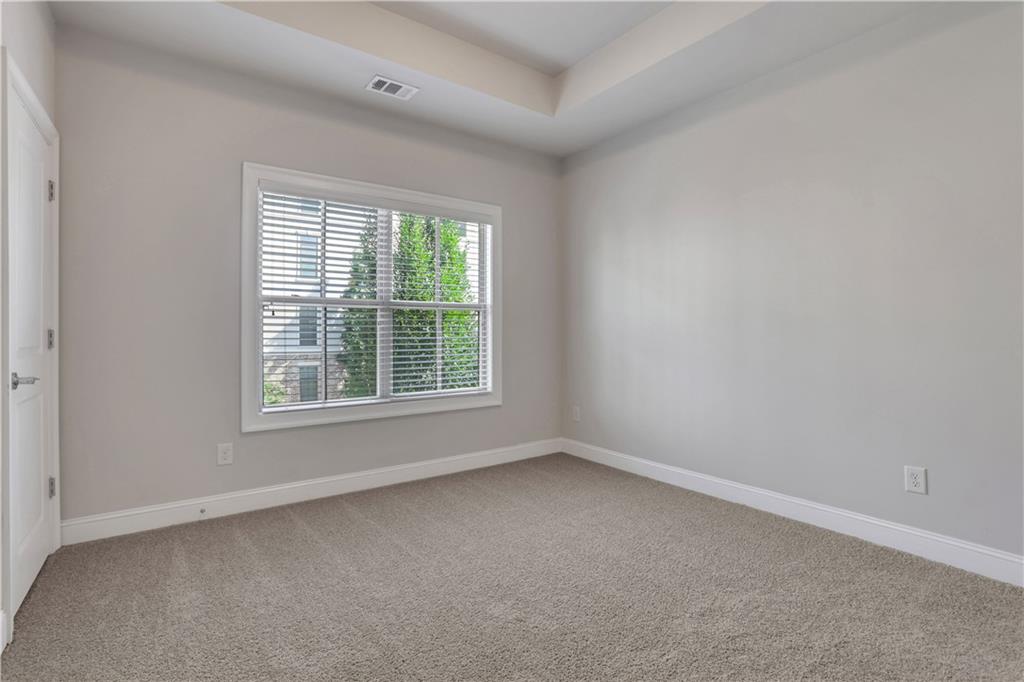 4103 Township Parkway Atlanta, GA 30342 - Photo 20 of 42 an empty room with a window