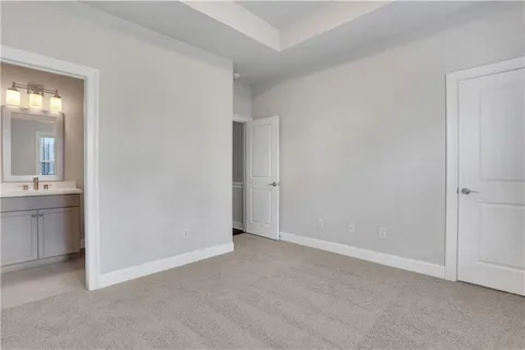 an empty room with a bathroom