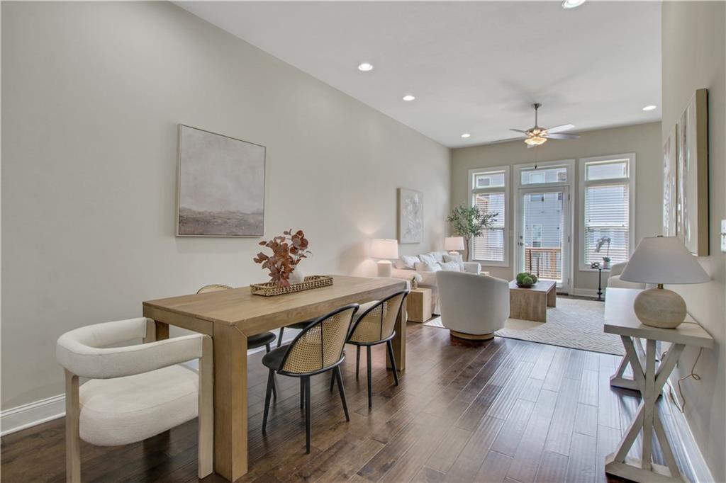 4103 Township Parkway Atlanta, GA 30342 - Photo 7 of 42 a view of a dining room with furniture window and wooden floor