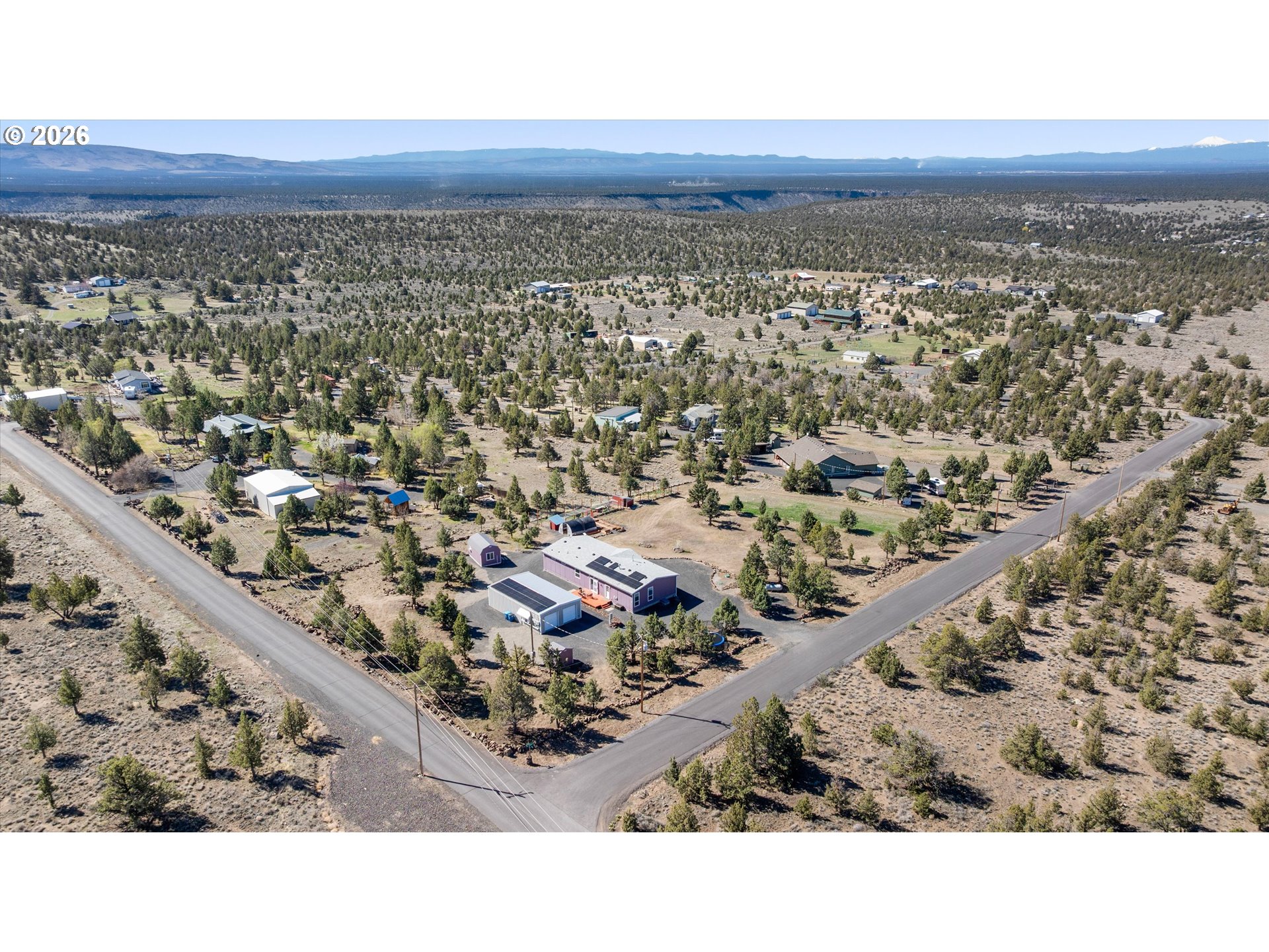 5172 Southeast Oswego Road Prineville, OR 97754 - Photo 47 of 48 an aerial view of a house with a yard