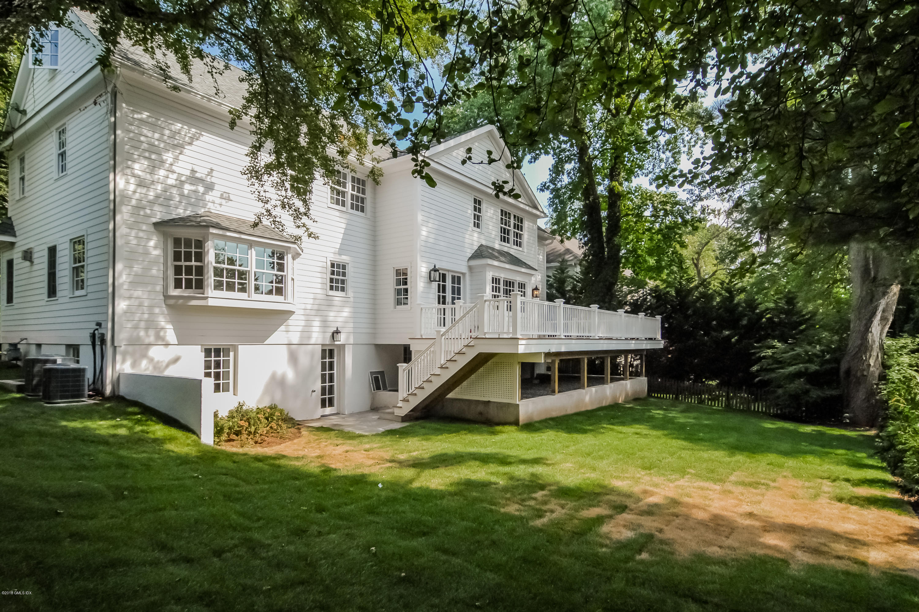 6 Dialstone Lane Riverside, CT 06878 - Photo 1 of 24 a view of a house with backyard and garden