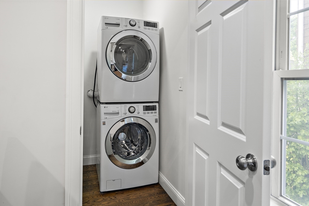 38 Pearl Street, Unit 2 Everett, MA 02149 - Photo 9 of 26 a utility room with sink dryer and washer