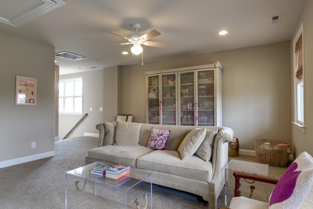 1409 Eliot Road Franklin, TN 37064 - Photo 20 of 27 a living room with furniture and a large window