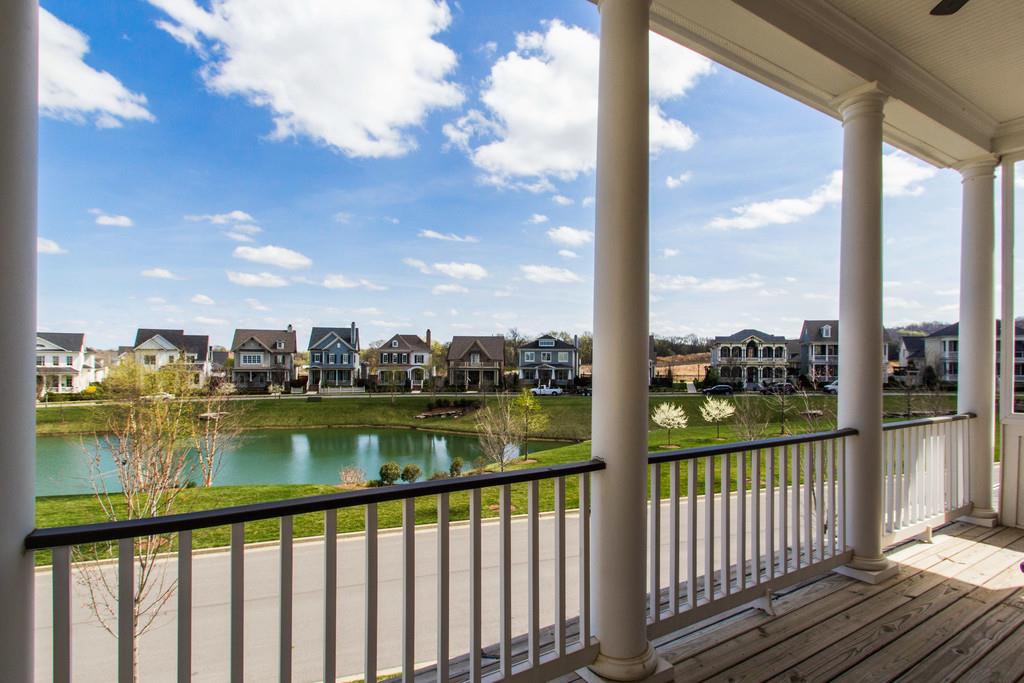 1409 Eliot Road Franklin, TN 37064 - Photo 22 of 27 a view of a lake from a balcony