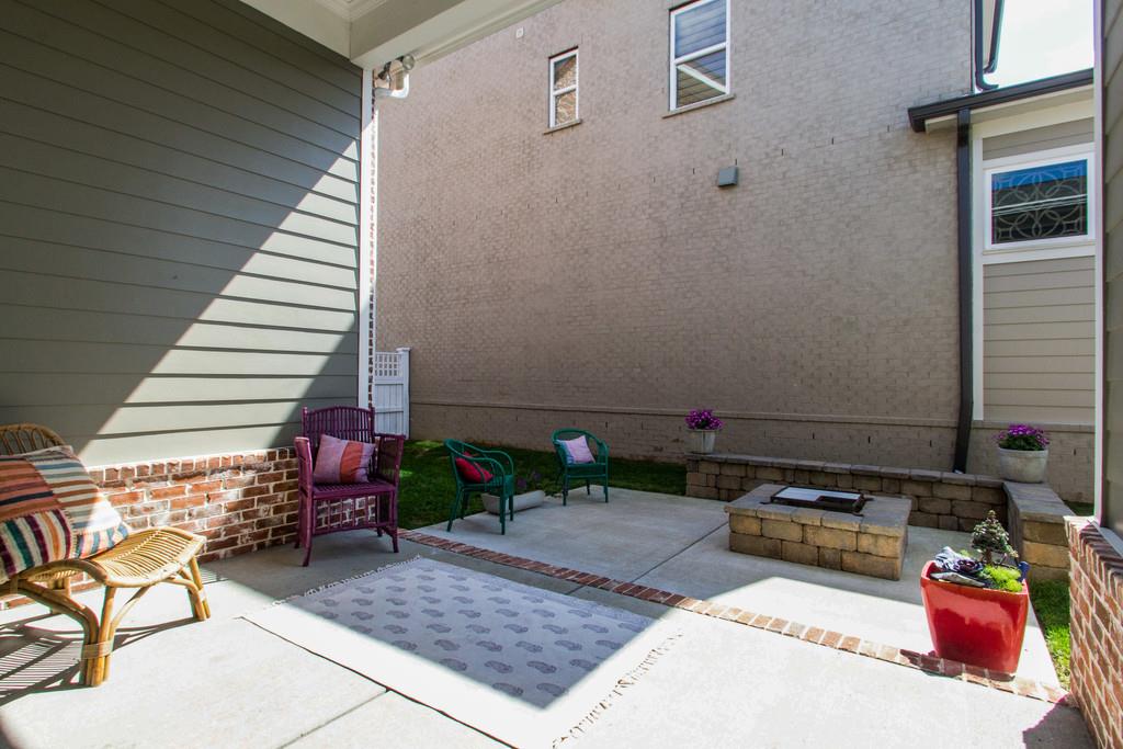1409 Eliot Road Franklin, TN 37064 - Photo 23 of 27 a backyard of a house with seating space