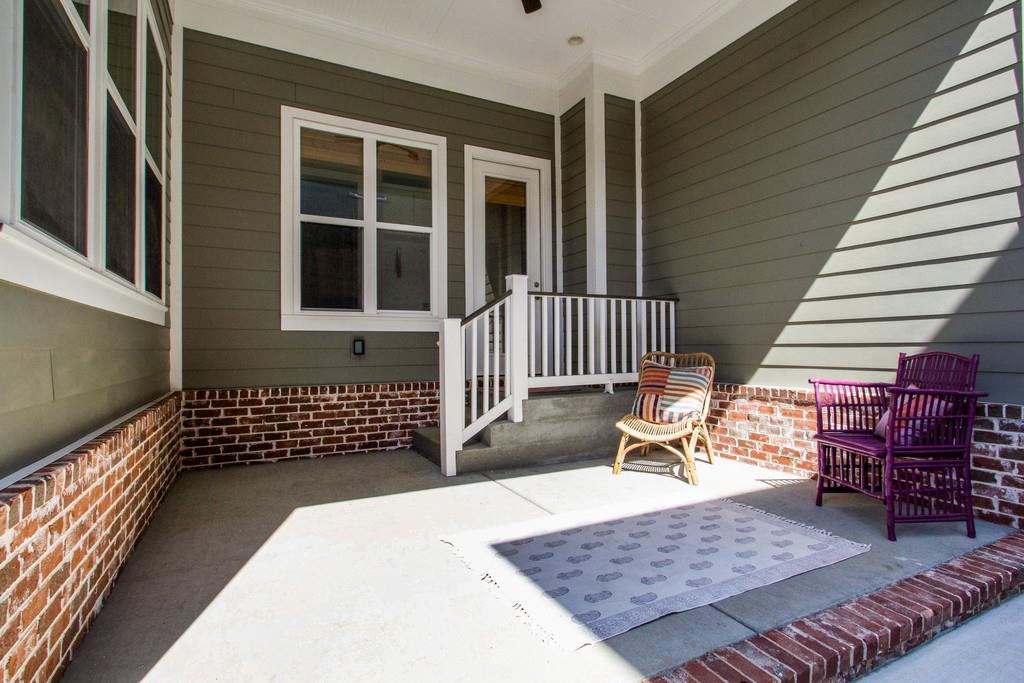 1409 Eliot Road Franklin, TN 37064 - Photo 24 of 27 a balcony view with a chair and table
