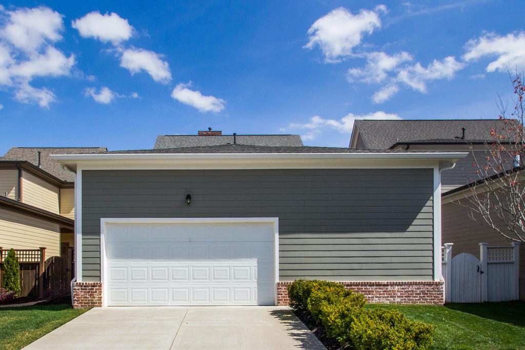 1409 Eliot Road Franklin, TN 37064 - Photo 26 of 27 a view of a house with a yard