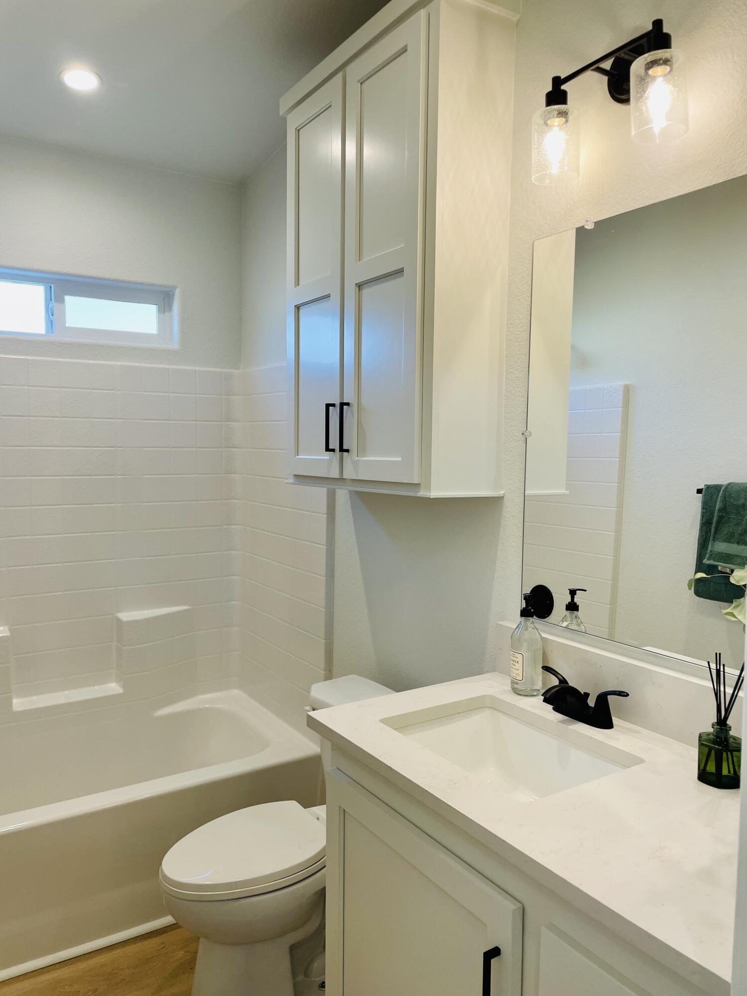 340 Old Mill Road, Unit SPC 214 Santa Barbara, CA 93110 - Photo 16 of 31 a bathroom with a sink a toilet and a bathtub