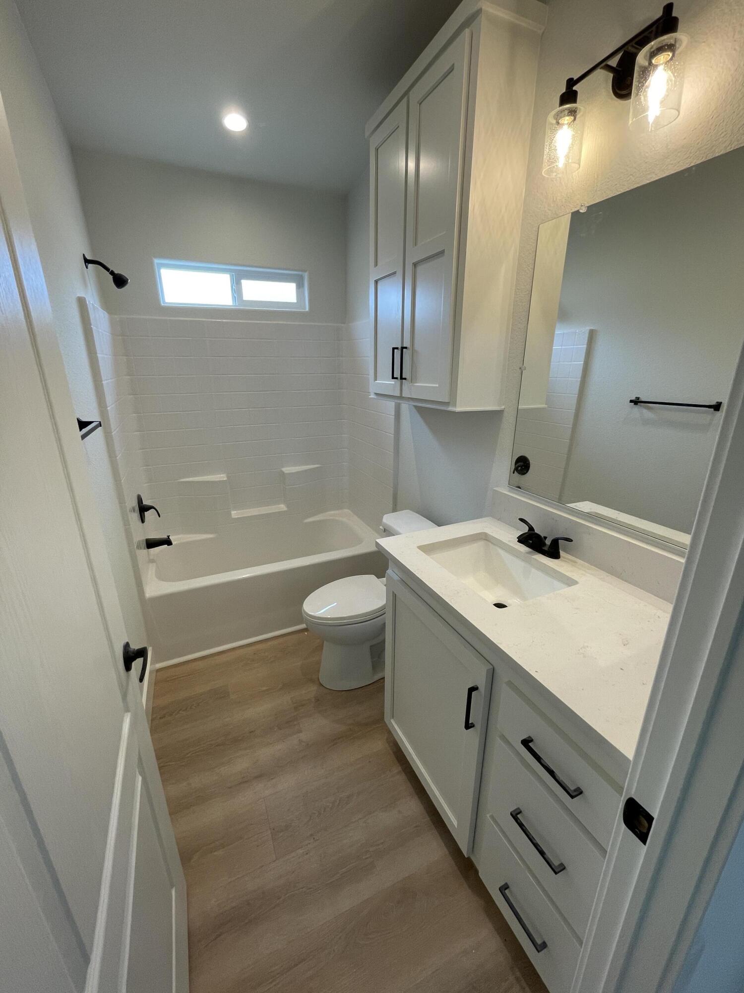 340 Old Mill Road, Unit SPC 214 Santa Barbara, CA 93110 - Photo 17 of 31 a bathroom with a sink a toilet a mirror and shower