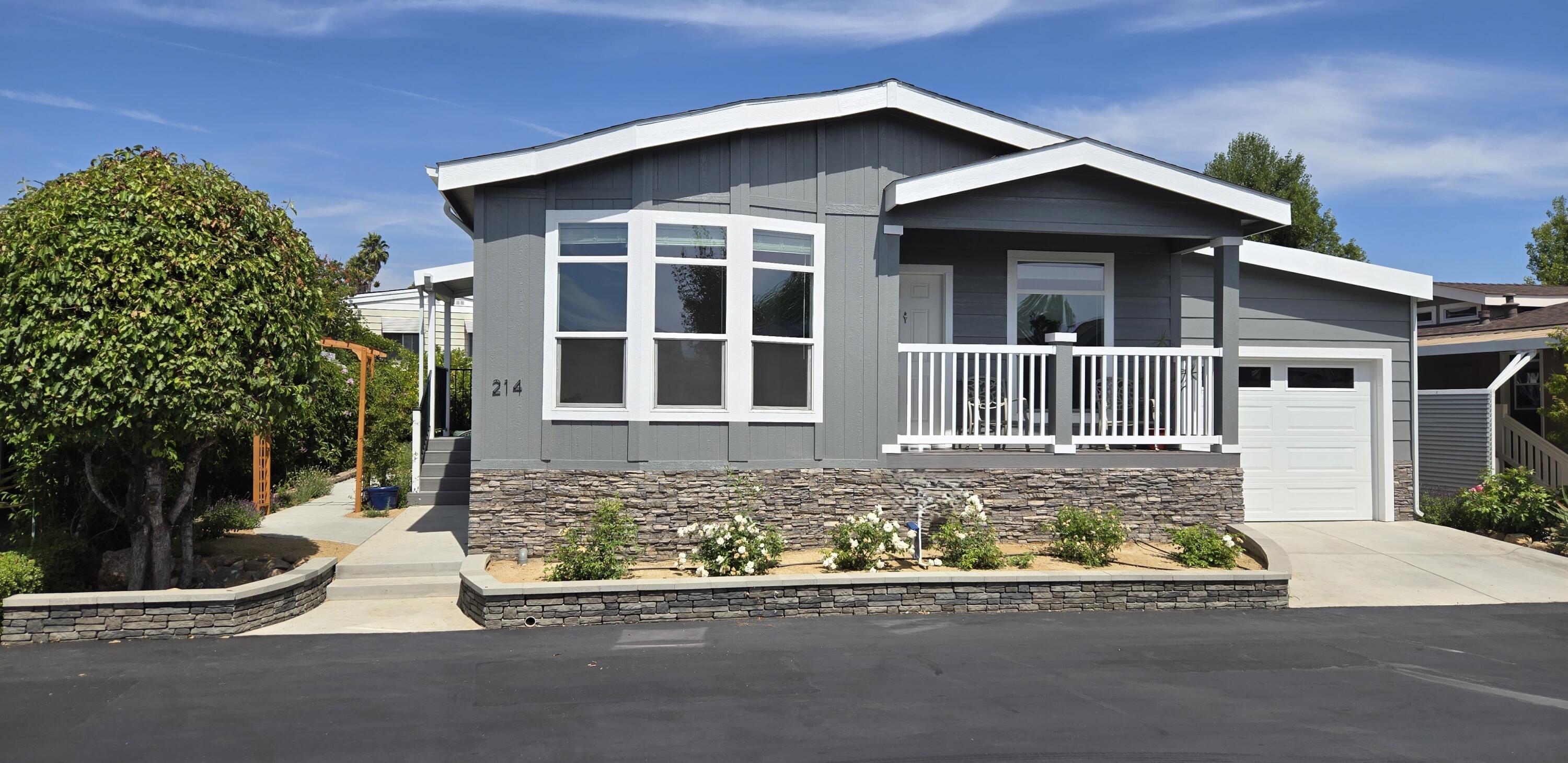 340 Old Mill Road, Unit SPC 214 Santa Barbara, CA 93110 - Photo 2 of 31 front view of a house with a yard