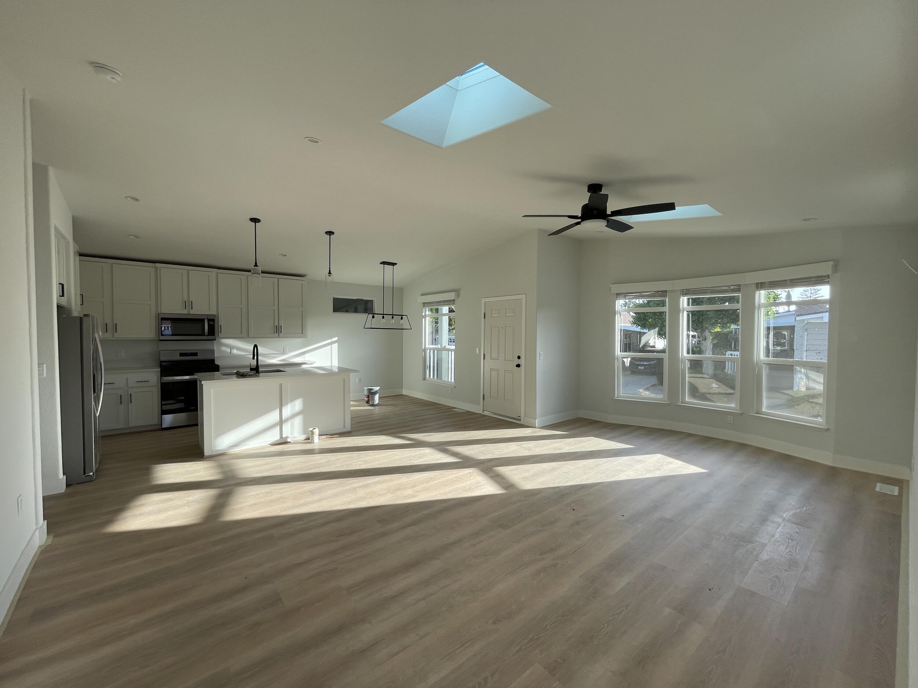 340 Old Mill Road, Unit SPC 214 Santa Barbara, CA 93110 - Photo 20 of 31 a view of kitchen with cabinets and wooden floor