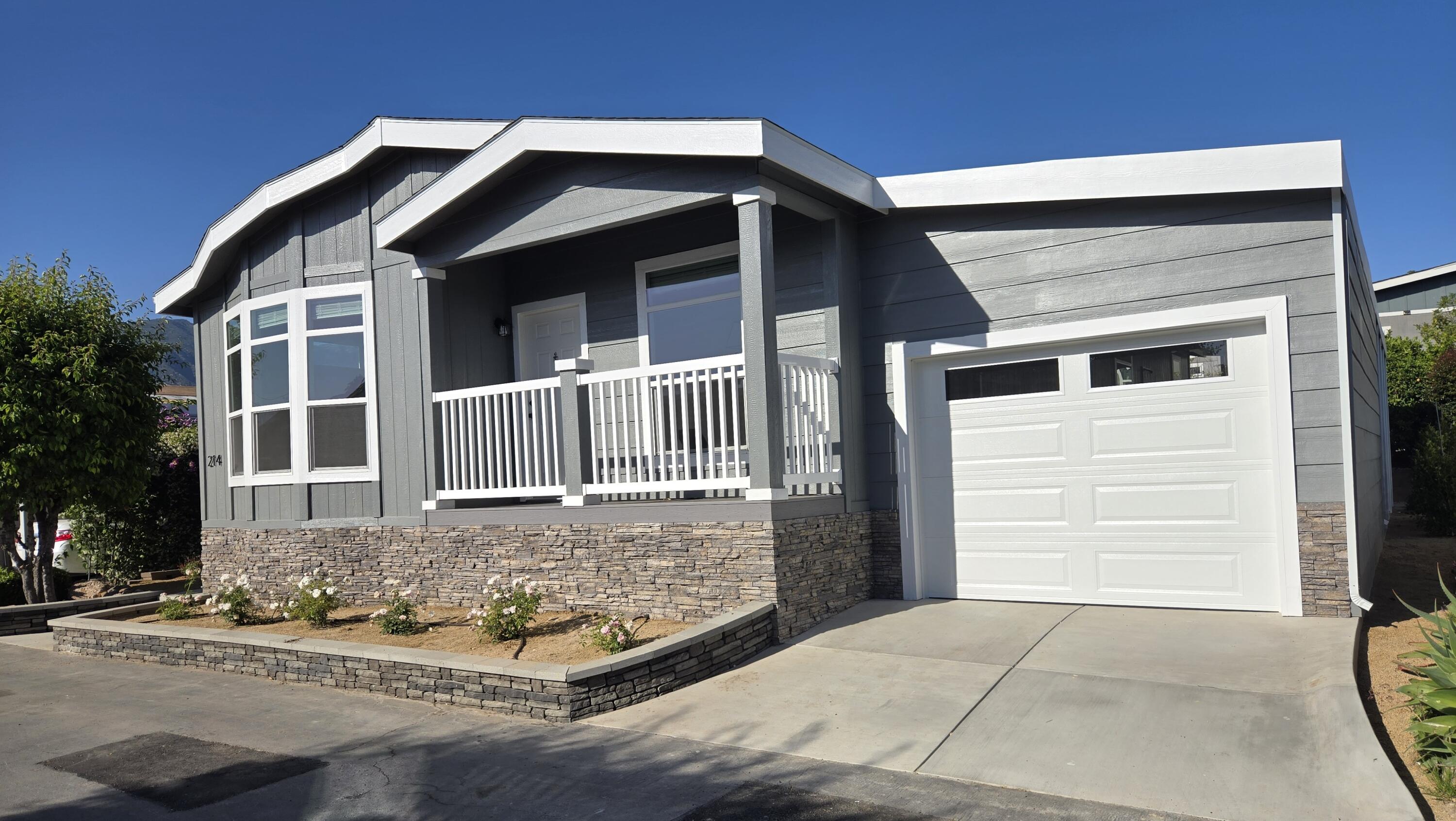 340 Old Mill Road, Unit SPC 214 Santa Barbara, CA 93110 - Photo 3 of 31 a front view of a house with a yard