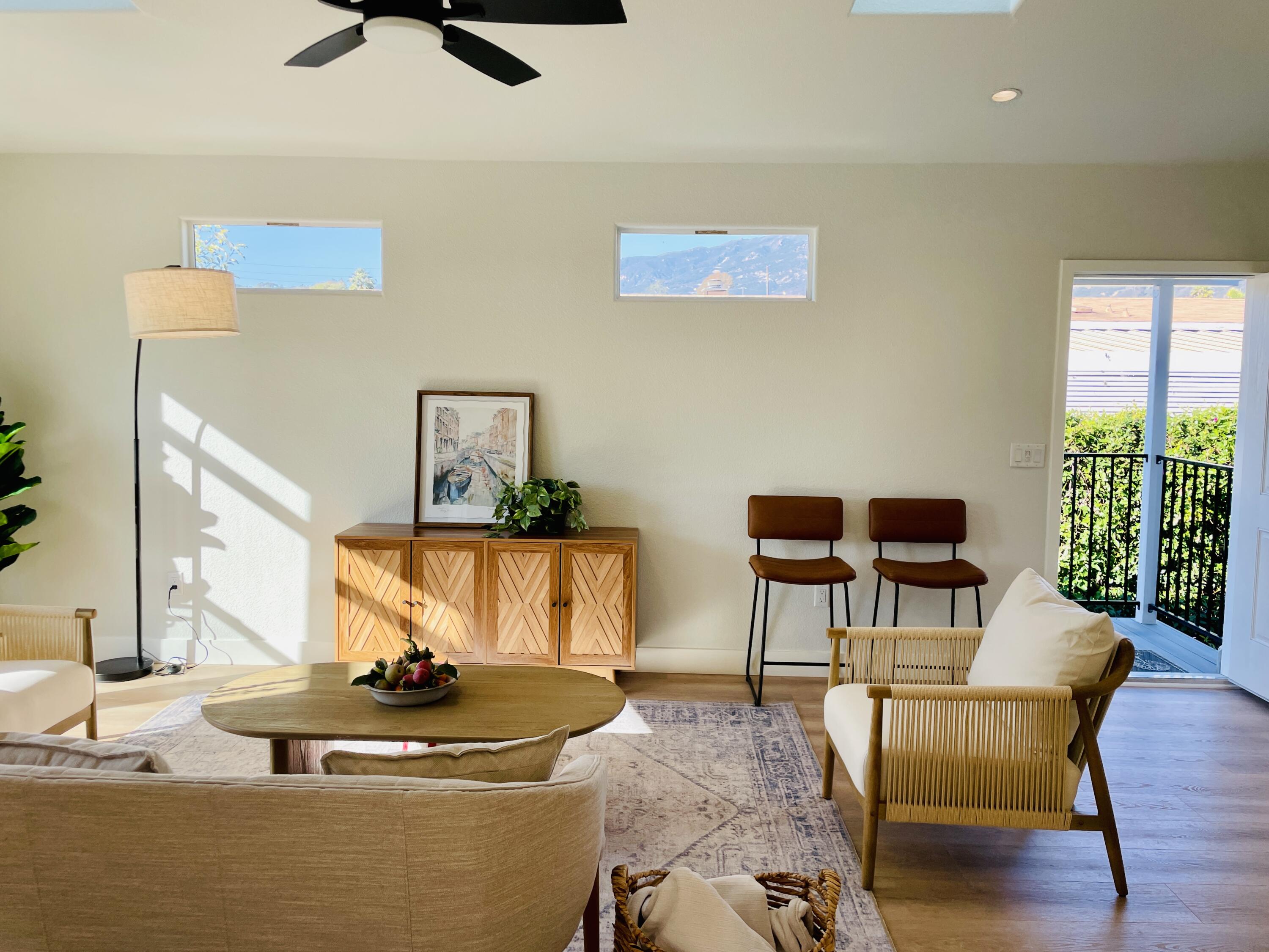 340 Old Mill Road, Unit SPC 214 Santa Barbara, CA 93110 - Photo 8 of 31 a living room with furniture and a wooden floor