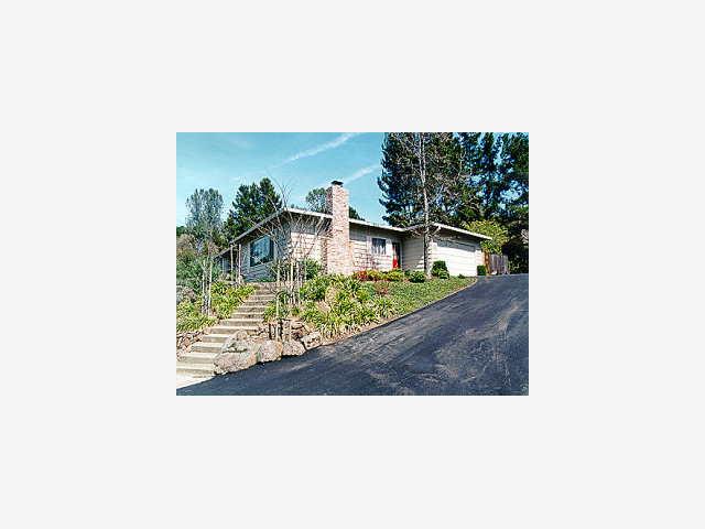 1050 Trinity Drive Menlo Park, CA 94025 - Photo 1 of 1 a picture of a bench in a backyard