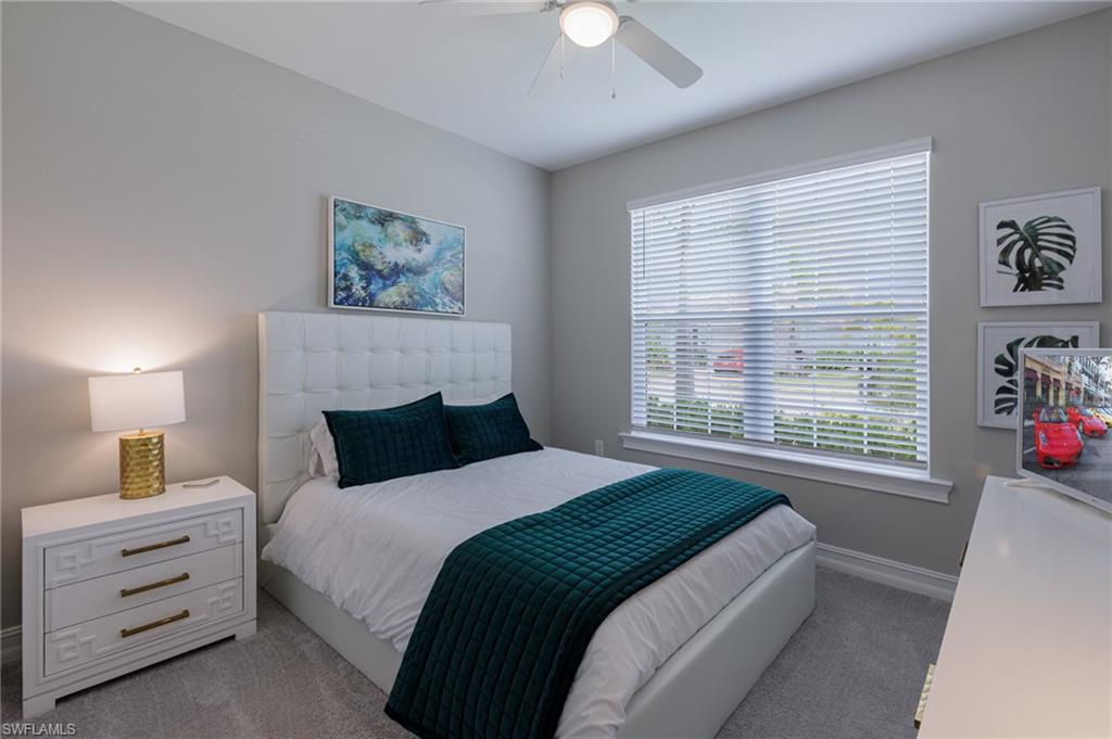 14614 Stillwater Way Naples, FL 34114 - Photo 25 of 47 a bedroom with a bed and a window