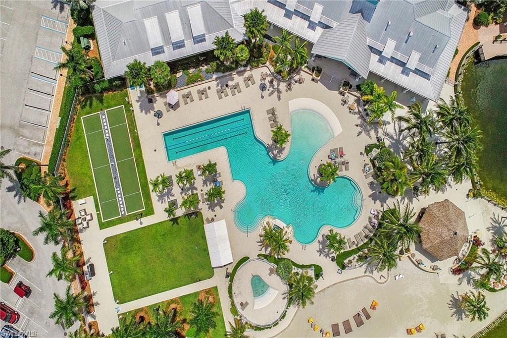 14614 Stillwater Way Naples, FL 34114 - Photo 35 of 47 an aerial view of a swimming pool